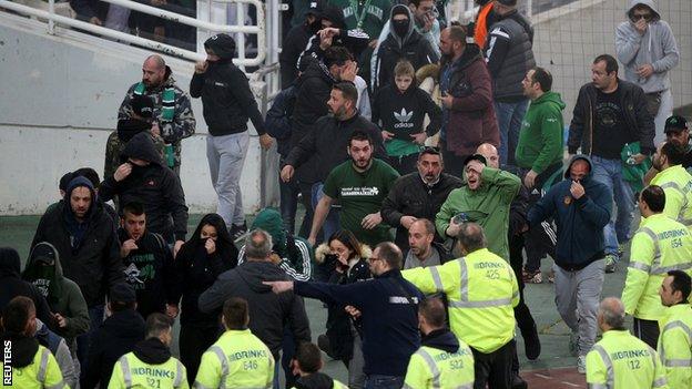 Fans escape tear gas