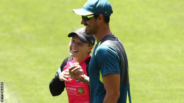 Alyssa Healy (left) and Mitchell Starc