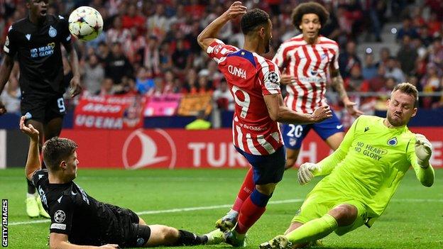 Simon Mignolet of Club Bruges makes a save in their Champions League game against Atletico Madrid