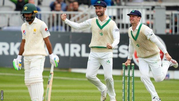 Pakistan's Asad Shafiq is dismissed as Irish pair Andrew Balbirnie and William Porterfield celebrate at Malahide in 2018