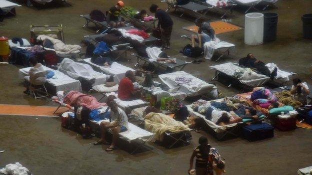People sleeping in a shelter