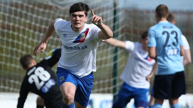 Jimmy Callacher celebrates scoring Linfield's opener at Ballymena