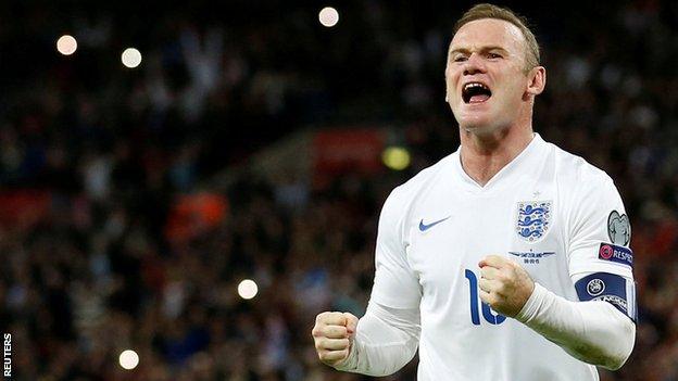 Wayne Rooney celebrates becoming England's all-time record goalscorer