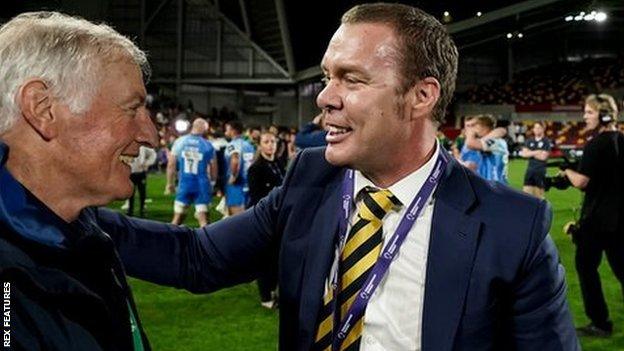 Co-owner Jason Whittingham (right) celebrated winning the Premiership Cup in May with former Warriors director of rugby Alan Solomons