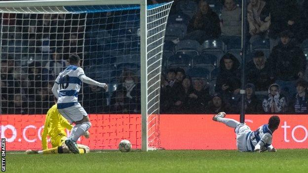 QPR's Chris Willock scores after a goalkeeping error from Joe Lumley