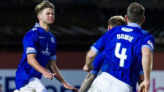 Queen of the South's Dom Thomas (left) celebrates scoring their third goal