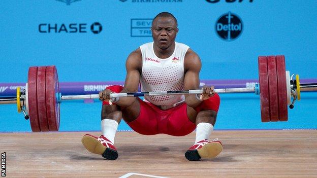 Cyrille Tchatchet II collapsed during his first clean and jerk in the men's 96kg final