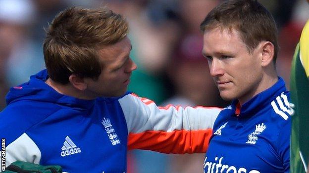 England one-day captain Eoin Morgan receives treatment after being hit on the head