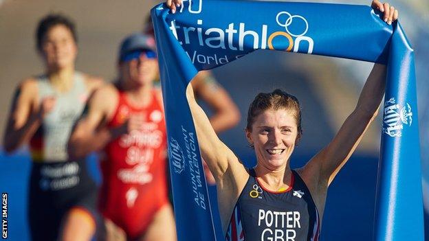 Britain's Beth Potter celebrates winning the Triathlon World Cup event in Valencia