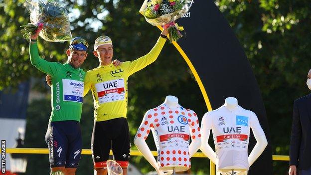 Mark Cavendish (left) with Tadej Pogacar