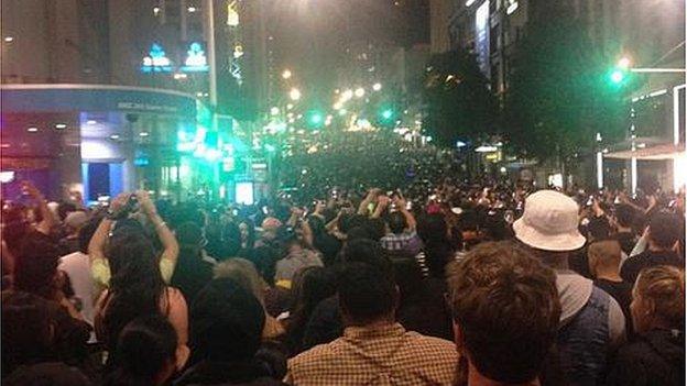 Crowds gather for New Year's Eve celebrations in Auckland, New Zealand