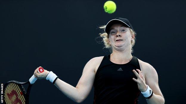 Francesca Jones returns a ball in her Australian Open first round match