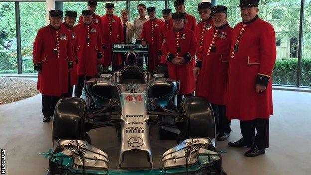 Chelsea pensioners with Mercedes F1 car