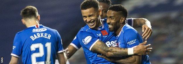 Tavernier and Defoe celebrate