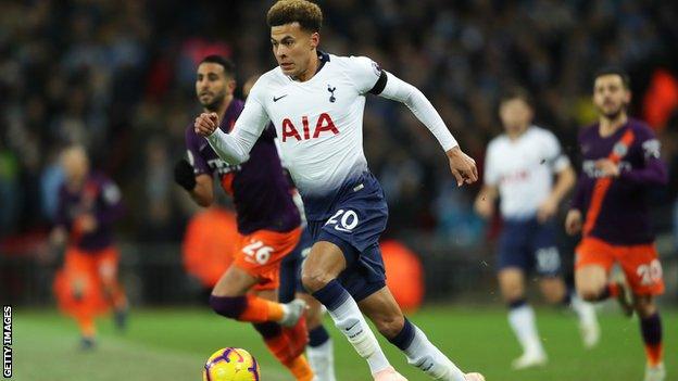 Dele Alli in action for Tottenham against Man City