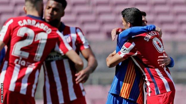 Luis Suarez and Lionel Messi embraced before kick-off