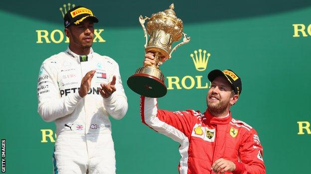 Lewis Hamilton and Sebastian Vettel on the podium at Silverstone