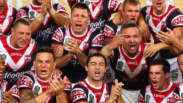 Anthony Minichiello leads Sydney Roosters' celebrations after the 2013 Grand Final