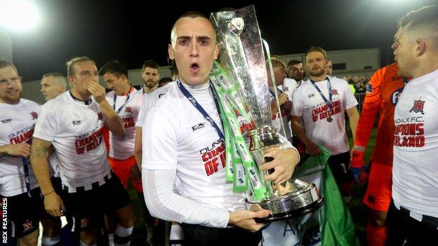 Dundalk winger Dylan Connolly celebrates with the Irish league title