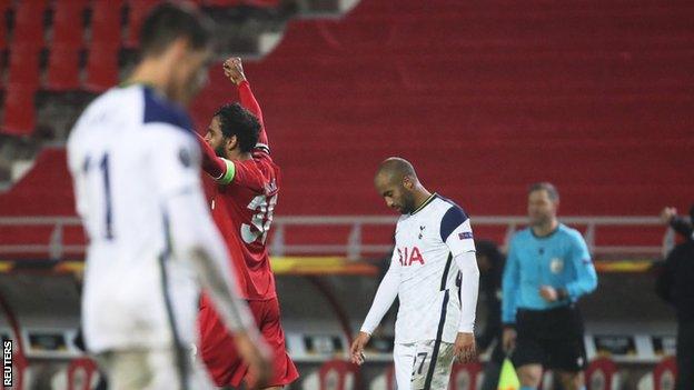 Royal Antwerp's players celebrate beating Tottenham in the Europa League