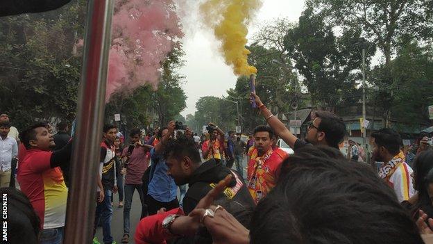 Fans outside the stadium