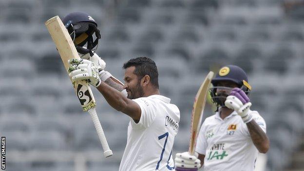 Sri Lanka's Dimuth Karunaratne celebrates his century against South Africa