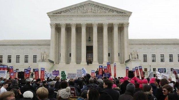 Demonstrators in favour of Obamacare gather at the Supreme Court building in Washington 4 March 2015