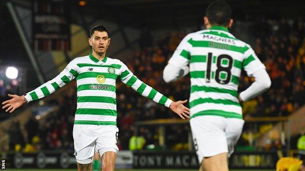 Celtic's Nir Bitton congratulates scorer Tom Rogic against Livingston