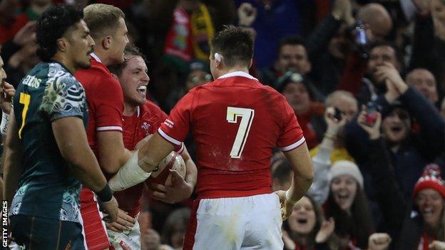 Ryan Elias and Wales team-mates celebrate