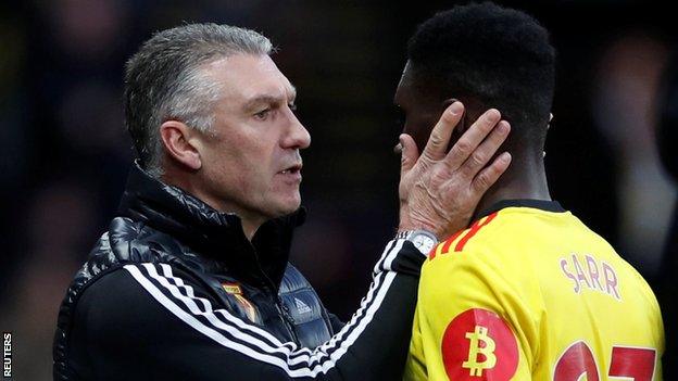 Watford manager Nigel Pearson congratulates Ismaila Sarr after the win over Manchester United