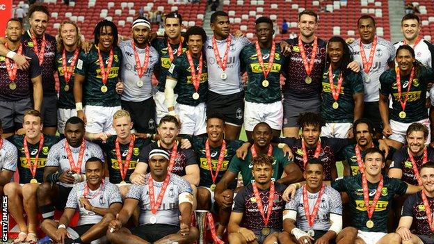 The Singapore Sevens top three teams pose for a photo