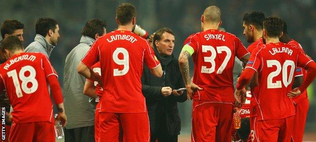 Brendan Rodgers talks to his Liverpool players