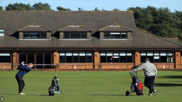 People playing golf