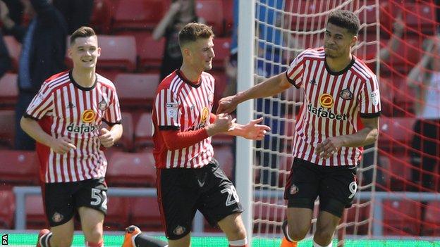 Sunderland players celebrate their second goal