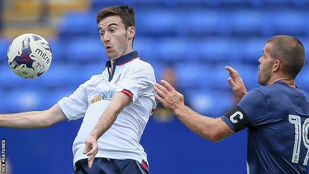 George Newell in action for Bolton Wanderers against Preston North End