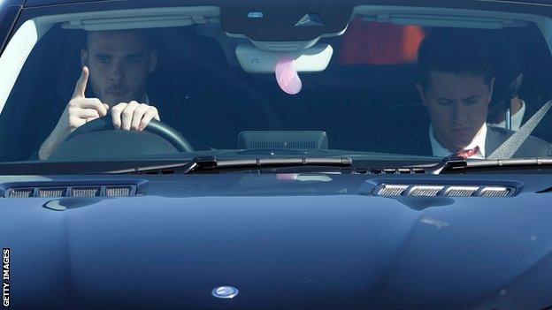 David de Gea (left) and Anders Herrera leaving Old Trafford