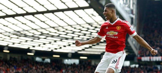 Marcus Rashford, celebrates after he sores the opening goal of the game during the English Premier League soccer match between Manchester United and Arsenal at Old Trafford Stadium, Manchester, England, Sunday, Feb. 28, 2016.