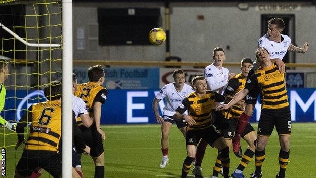 Lee Ashcroft crashes in his first header late in the first half