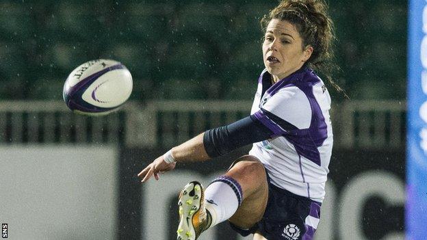 Lisa Martin kicks the ball for Scotland women