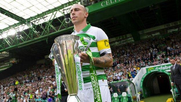 Celtic captain Scott Brown with the Scottish Premiership trophy