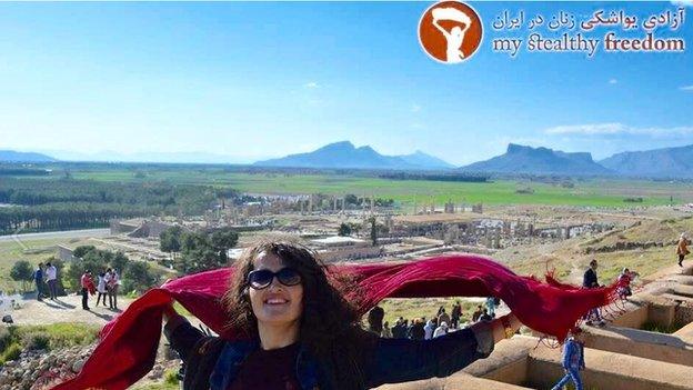 Female tourist in Iran removing her hijab