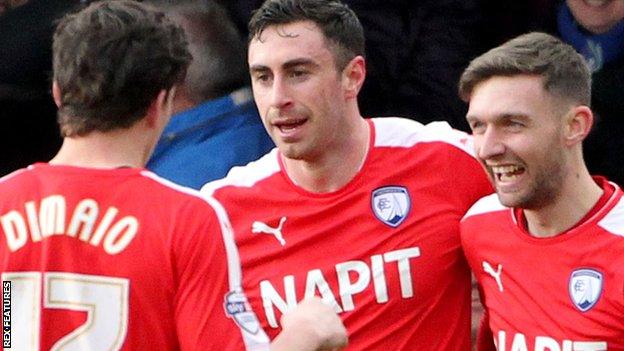 Lee Novak (centre) celebrates his Chesterfield goal