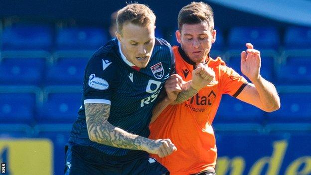 Lee Erwin (left) in action for Ross County