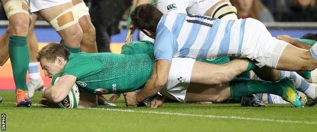 Kieran Marmion touches down for Ireland's opening try in the first half