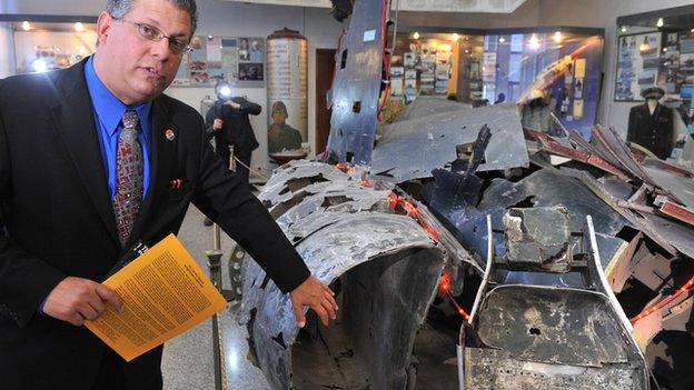 Gary Powers Jnr. with the wreckage of his father's U-2 plane in Moscow