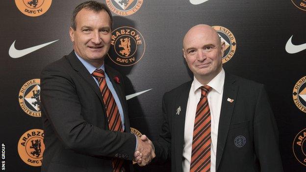 Chairman Stephen Thompson welcomes new manager Csaba Laszlo (left)