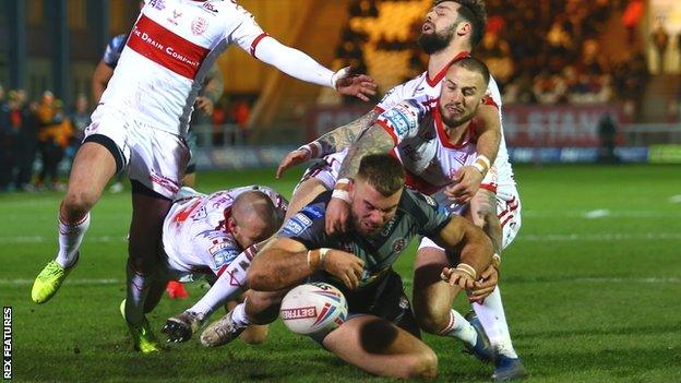 Mike McMeeken of Castleford Tigers fumbles the ball at the try line