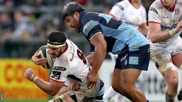 Marcell Coetzee of Ulster is tackled by Cardiff Blues' Nick Williams