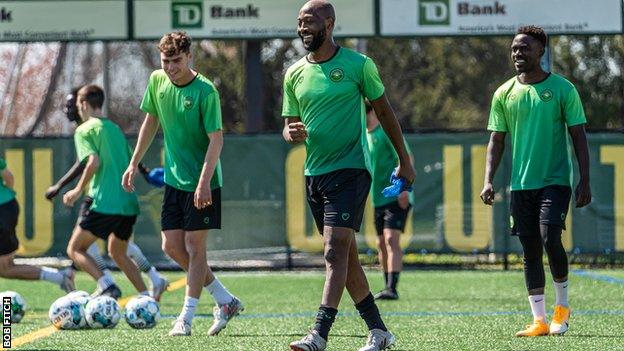 Owen O'Malley, Reuben Ayarna and Ndayisenga VanDame in training for Vermont Green