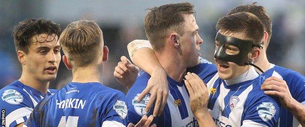 Coleraine celebrate their goal by skipper Darren McCauley